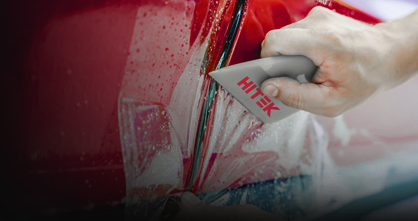 HITEK paint protection film being applied